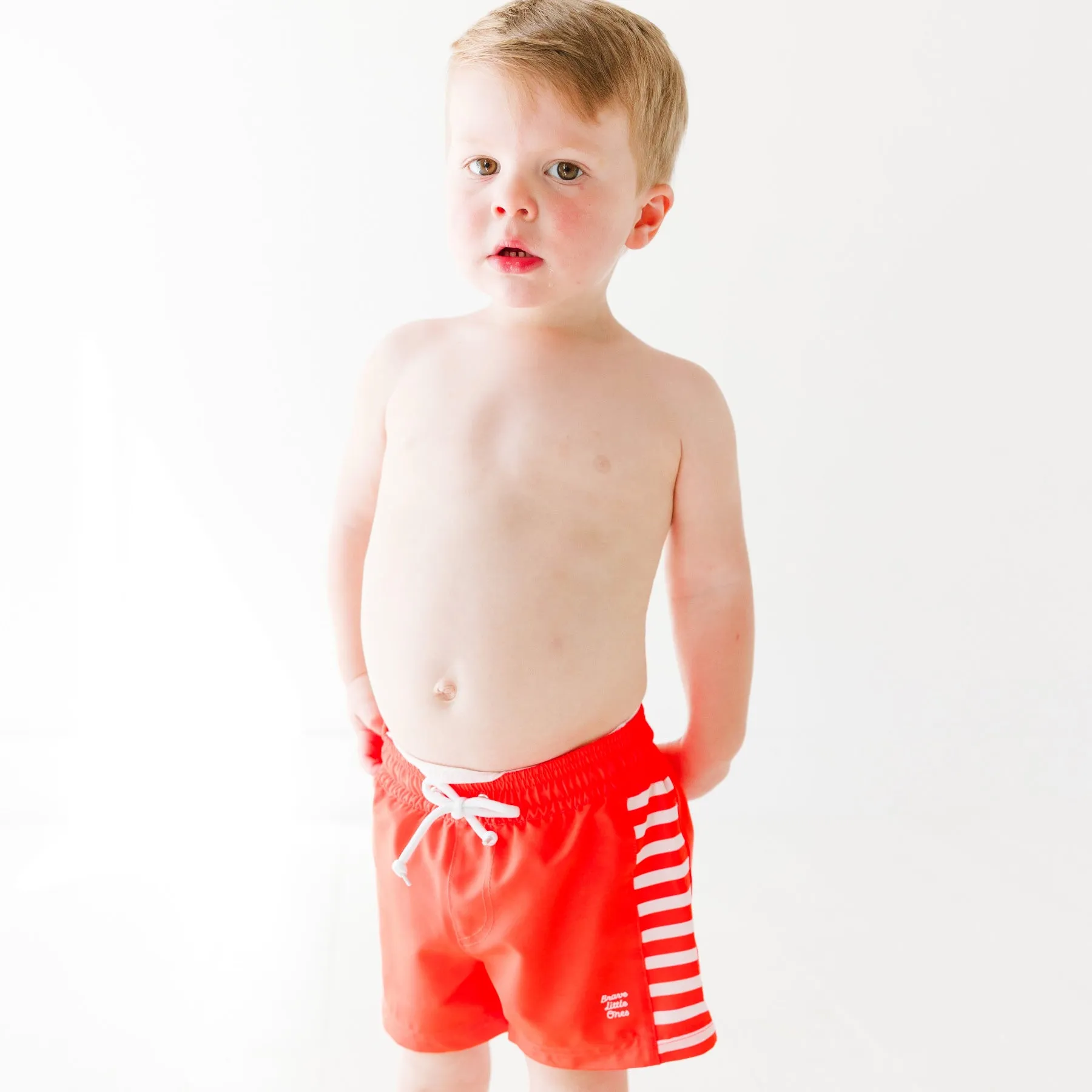 Neon Coral Stripe Swim Trunks