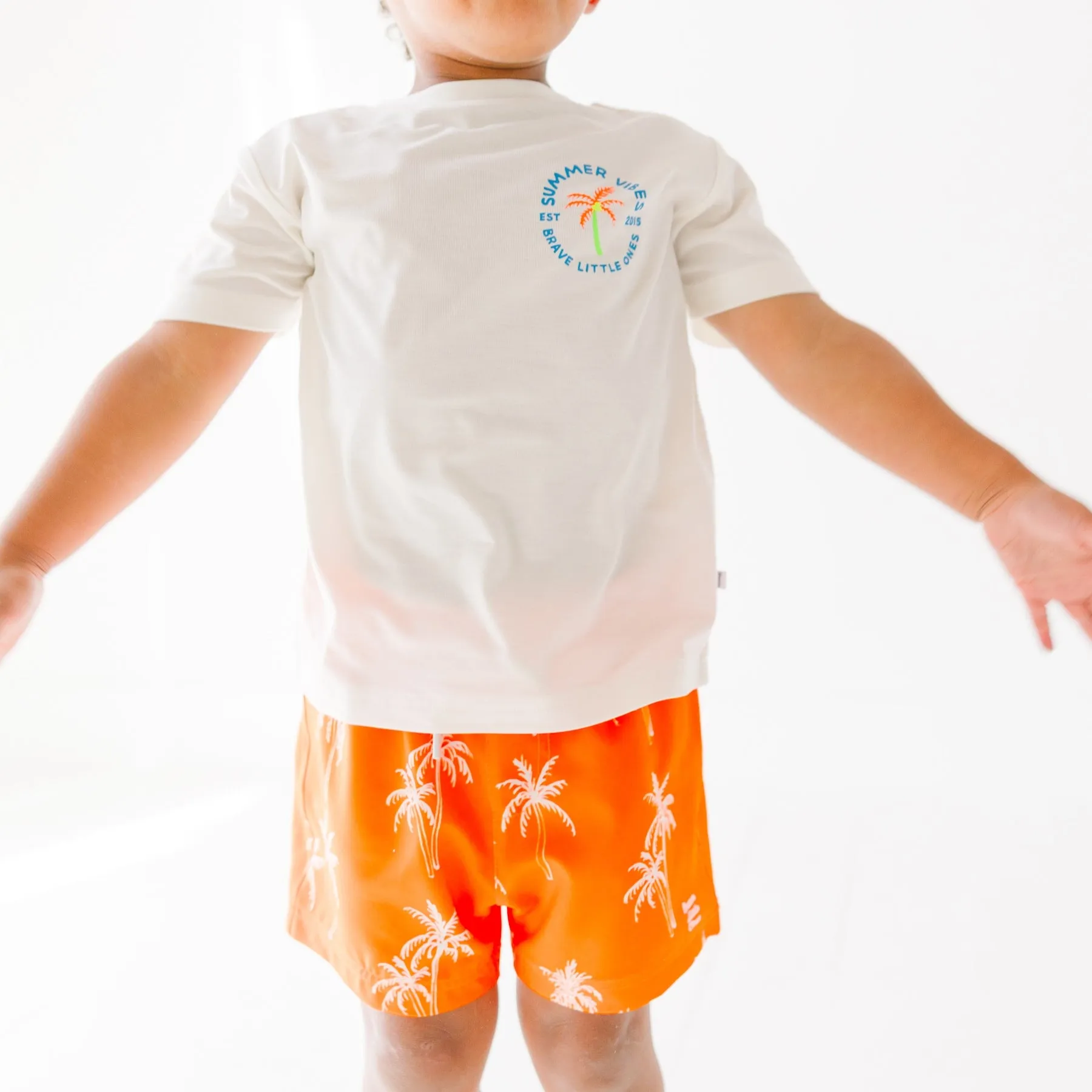 Neon Orange Palms Swim Trunks