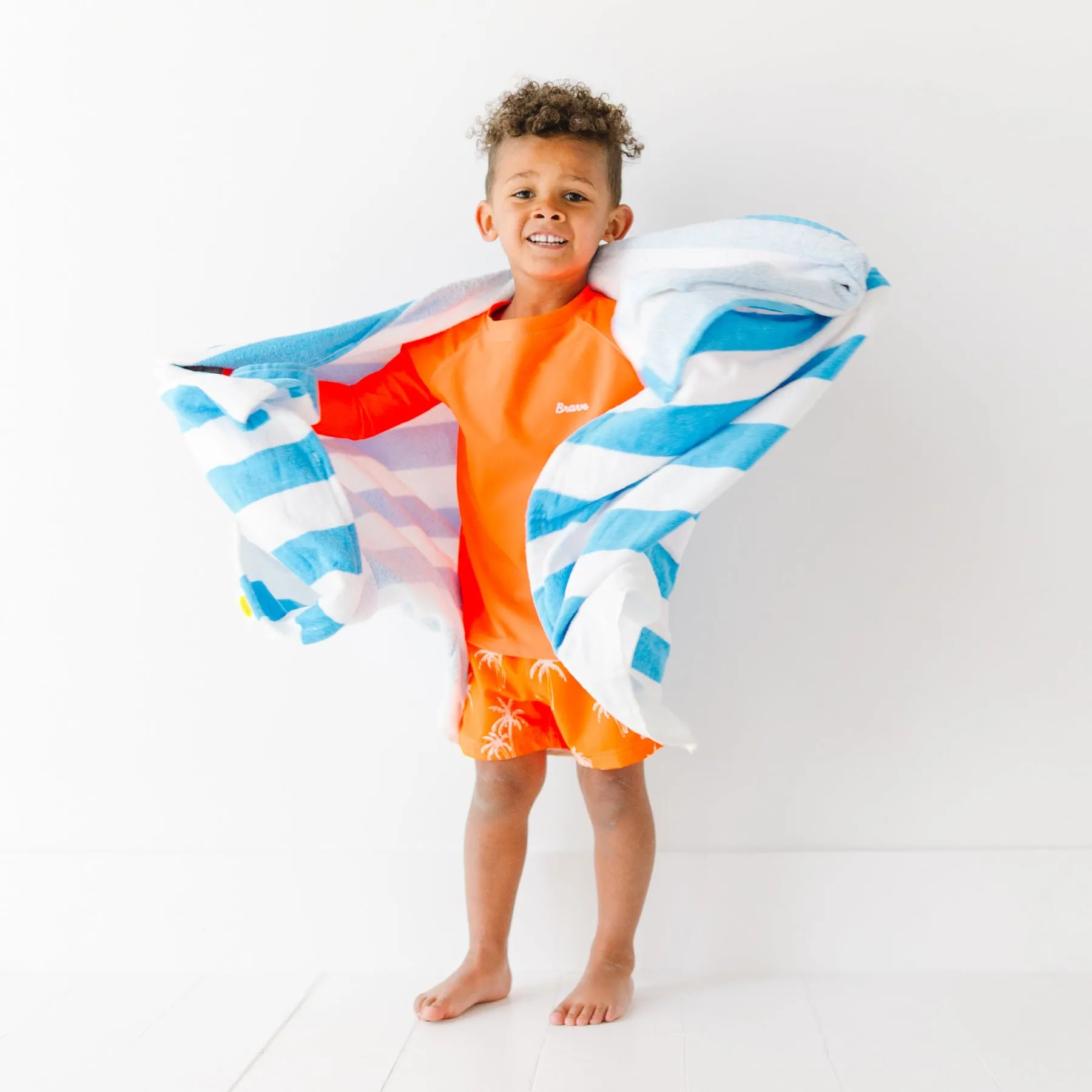 Neon Orange Palms Swim Trunks