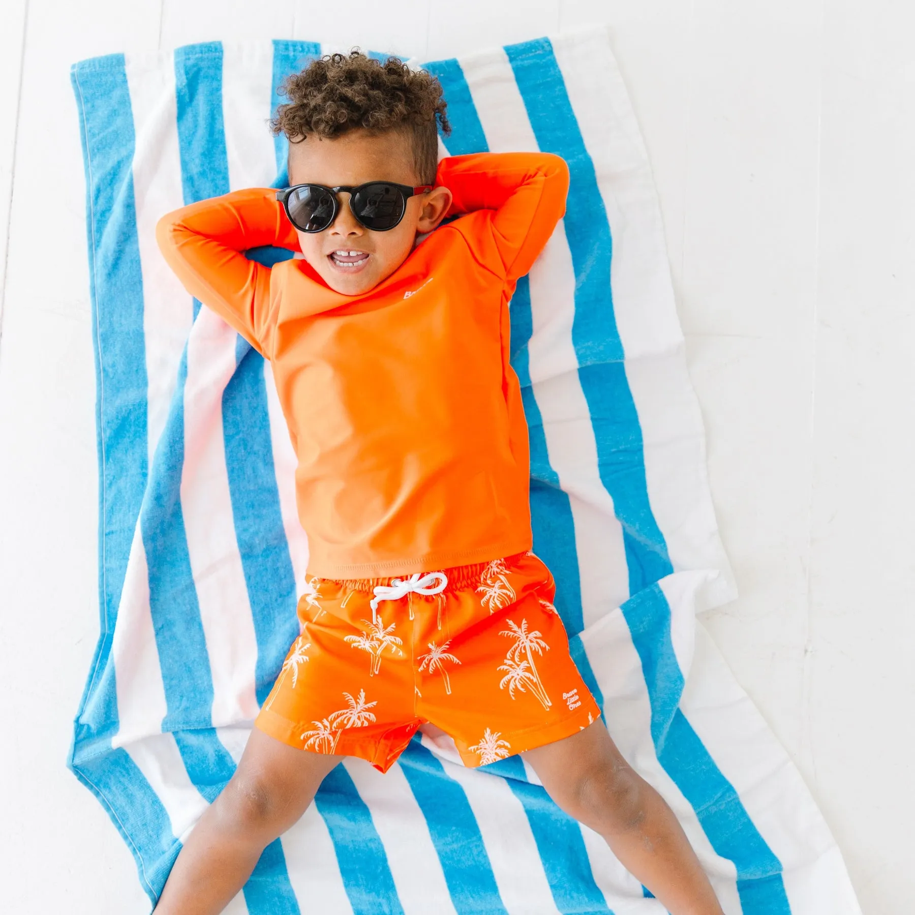 Neon Orange Palms Swim Trunks