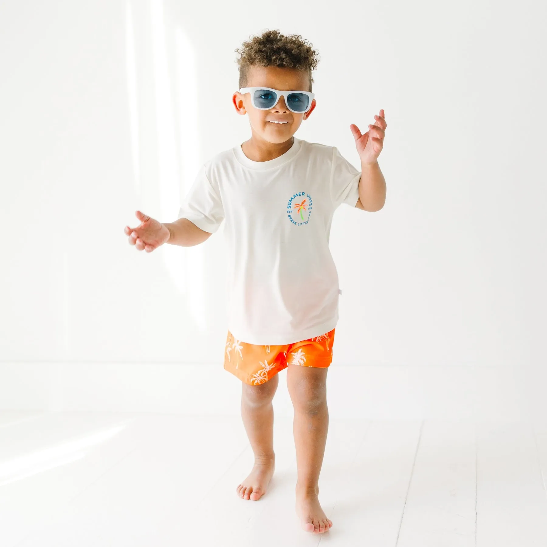 Neon Orange Palms Swim Trunks