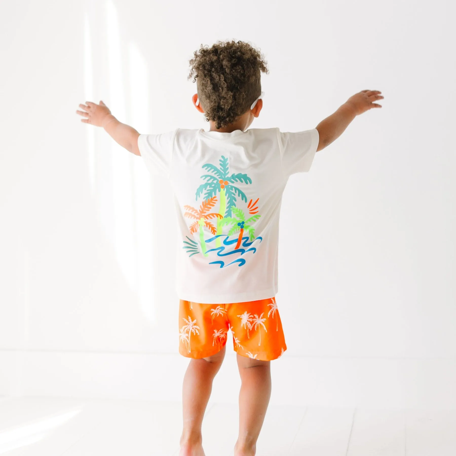 Neon Orange Palms Swim Trunks