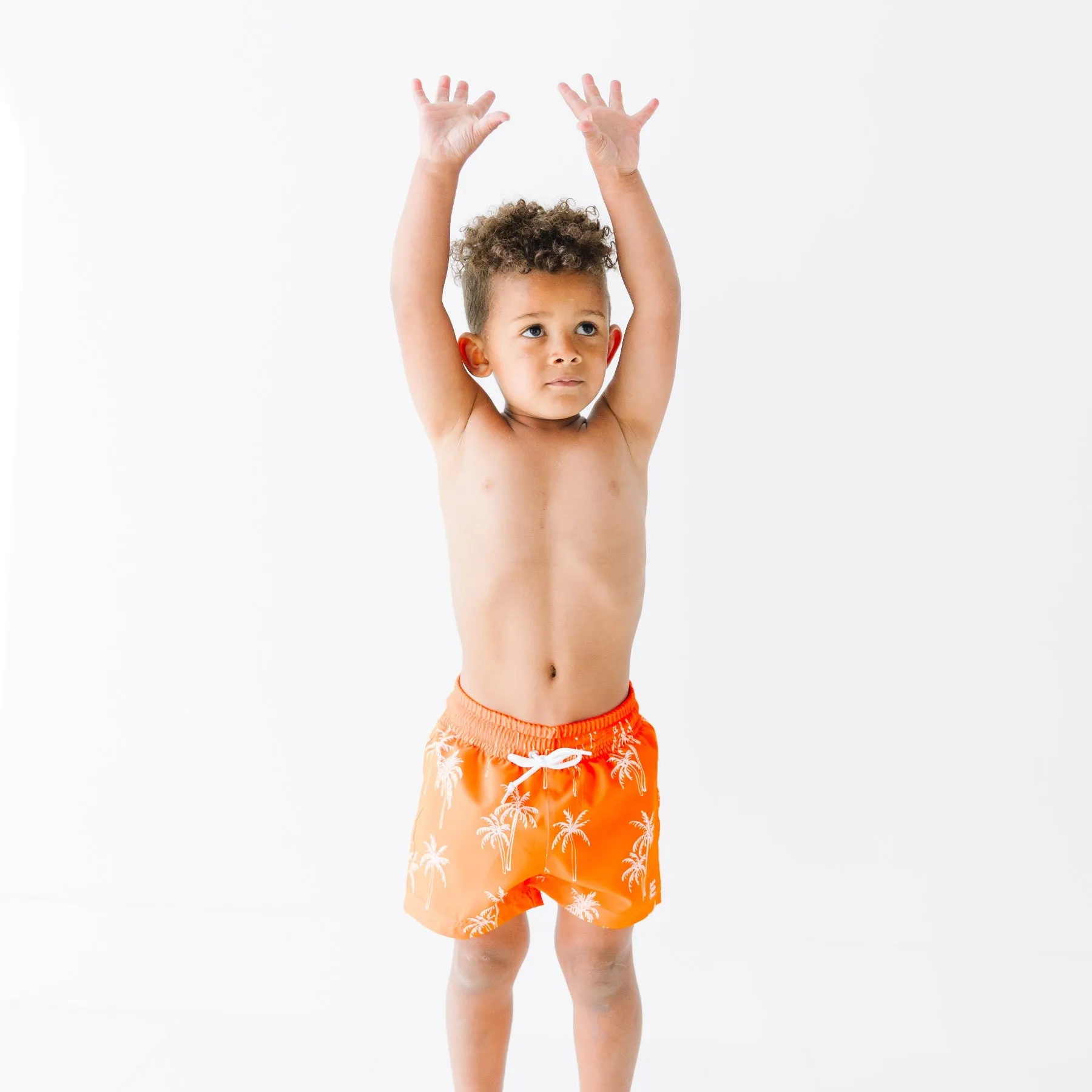 Neon Orange Palms Swim Trunks