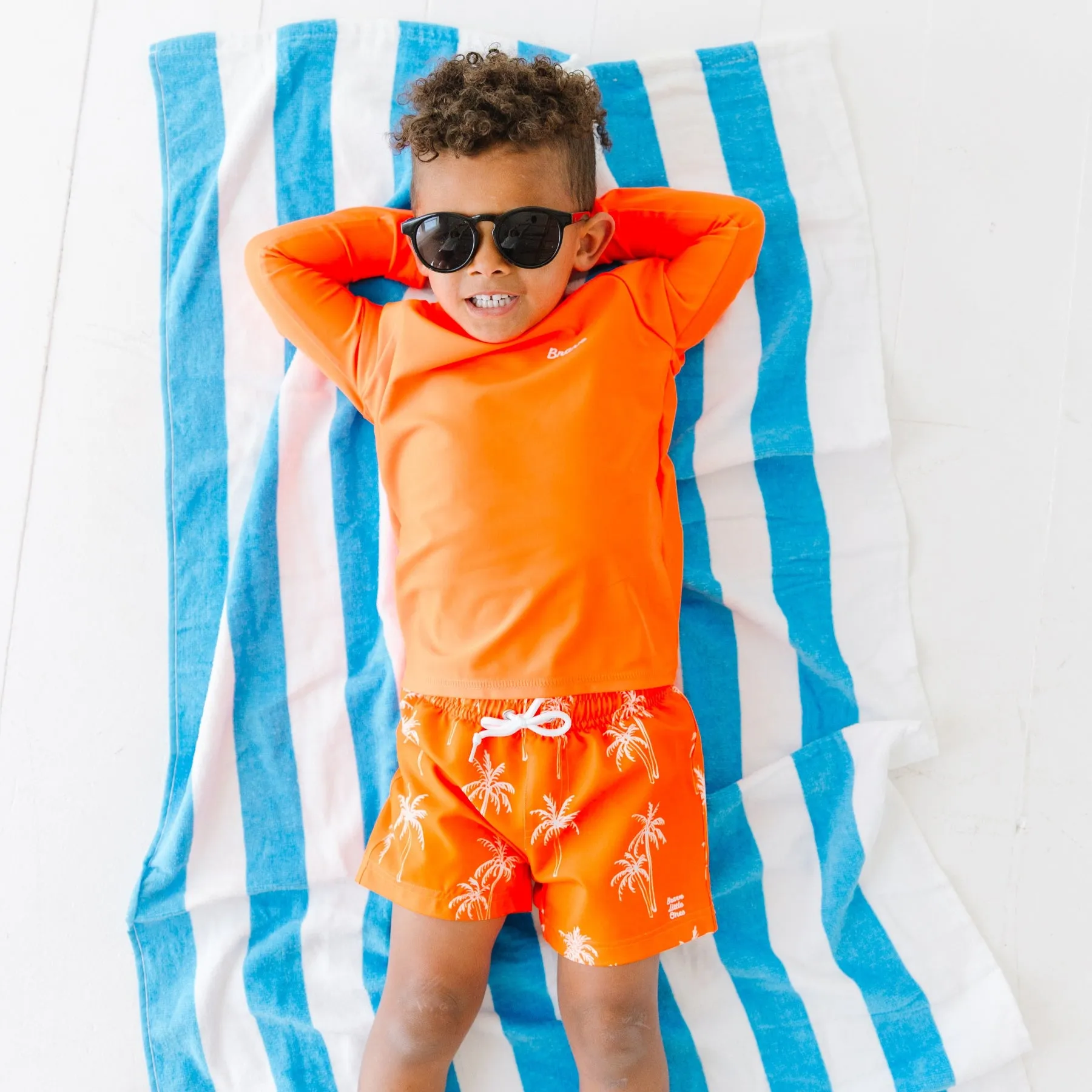 Neon Orange Palms Swim Trunks